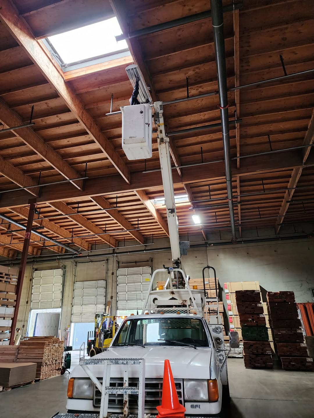 Warehouse lighting bucket truck